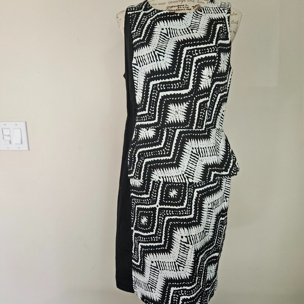 Dress with Peplum
